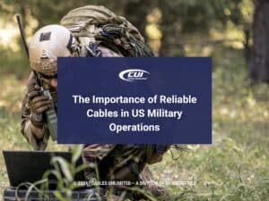 Featured: Soldier using computer in military operations- The Importance of Reliable Cables in US Military Operations