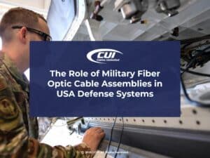 Military aircraft tech working on aircraft wiring- The Role of Military Fiber Optic Cable Assemblies in USA Defense Systems.